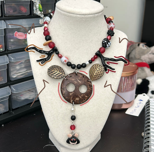 Mothman necklace