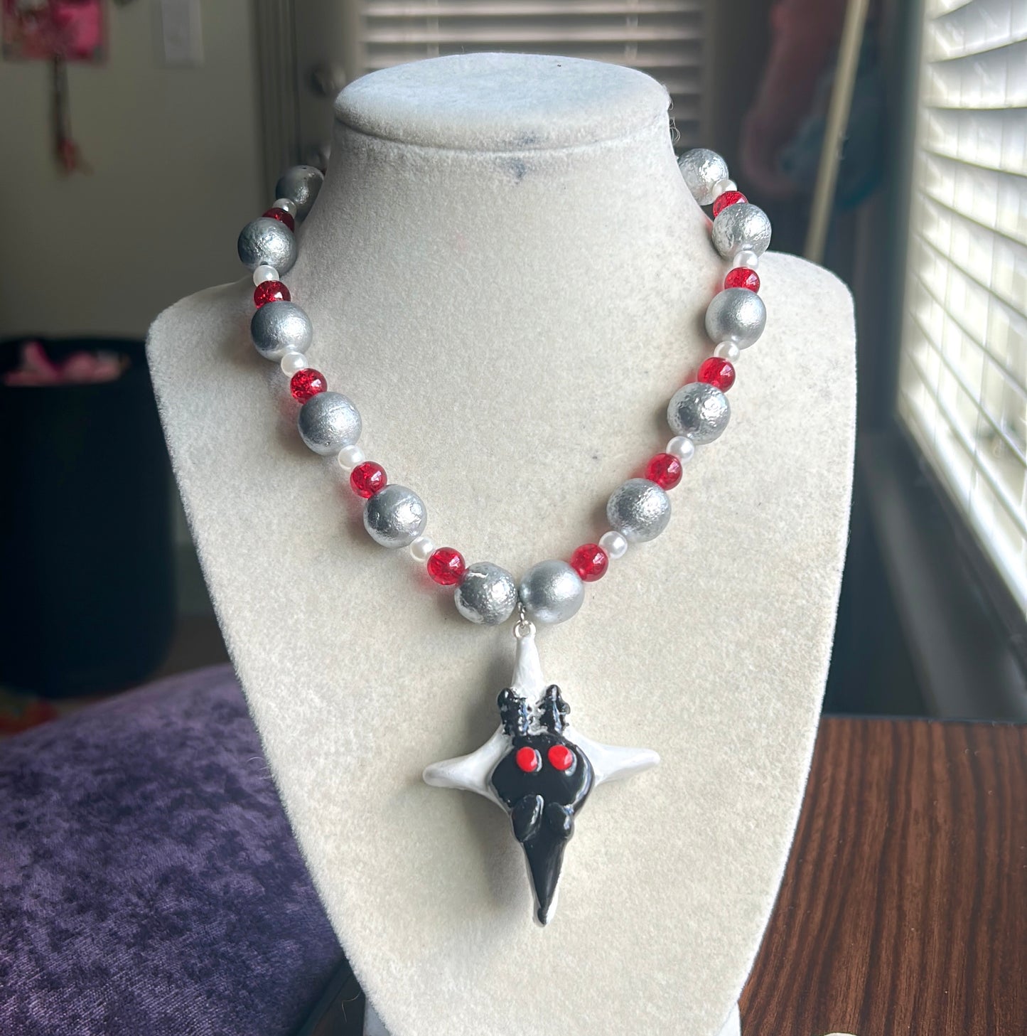 Mothman necklace