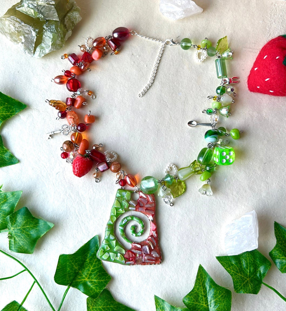 Red and green swirly necklace